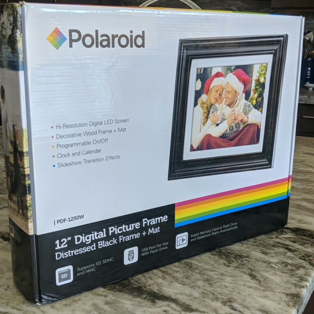 New in the box, 12 inch Polaroid Picture Frame